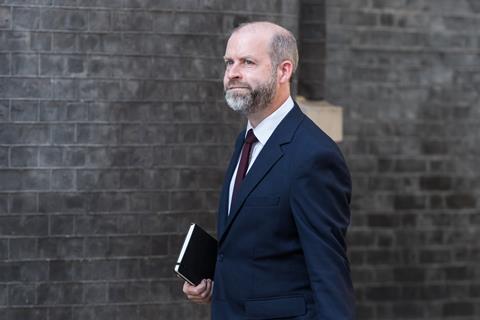 Jonathan Reynolds walking along Downing Street