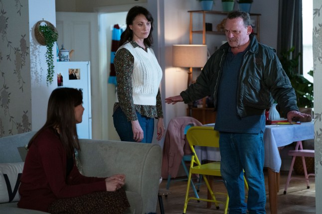 Bea sat with Billy and Honey looking at her