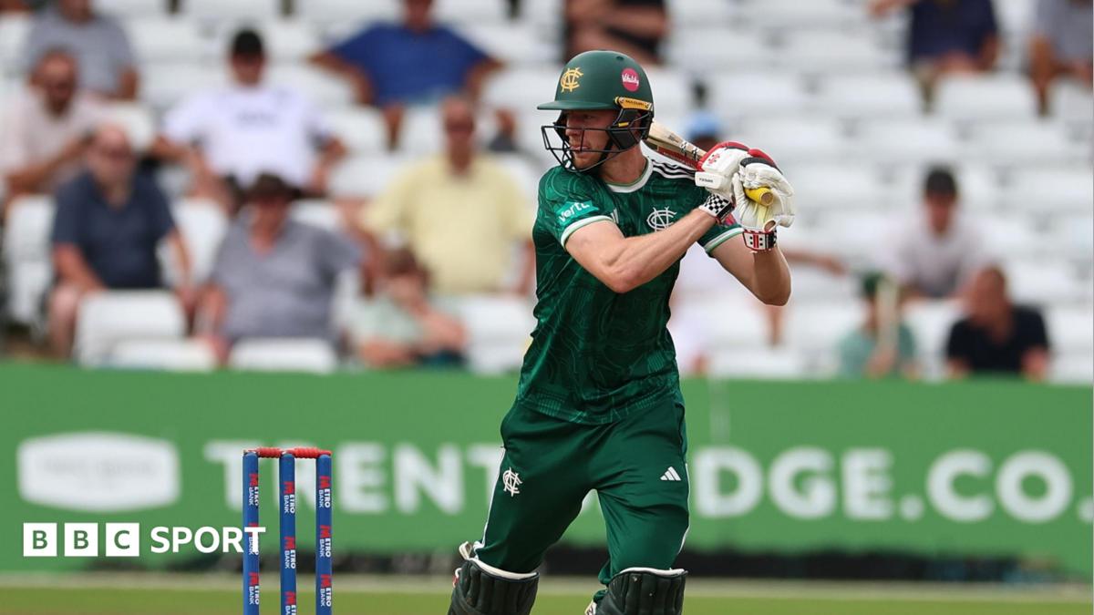 Lyndon James in the dark green kit of Notts Outlaws, plays a shot