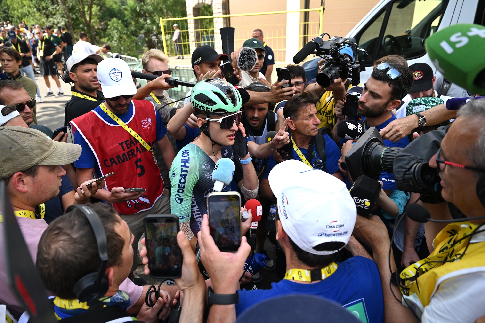 Paul Seixas of Decathlon CMA CGM Team talks to media after stage 6 in Gavarnie-Gedre