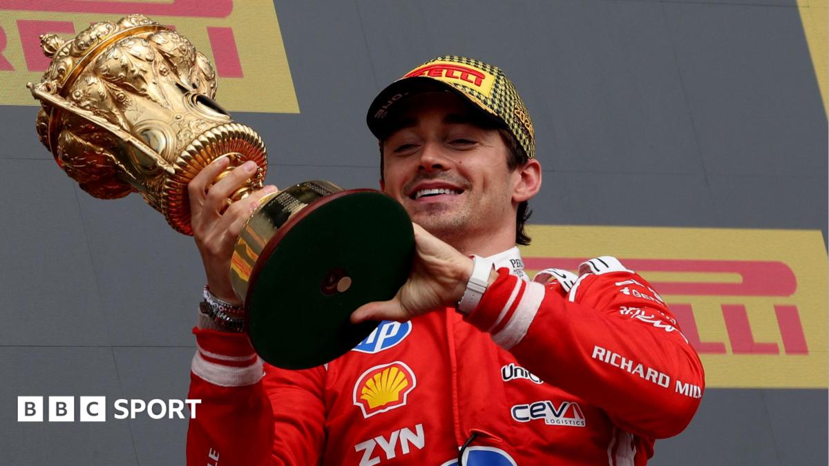 Ferrari's Charles Leclerc crosses the line to win the British Grand Prix with Mercedes George Russell and Ferrari's Lewis Hamilton behind him