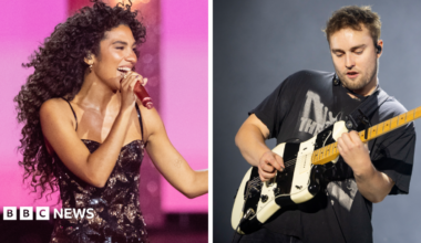 Picture of Olivia Dean on the left set against a pink backdrop, performing in a sparkly black dress with a composite of Sam Fender to the right in a black t-shirt with a black and white striped guitar.