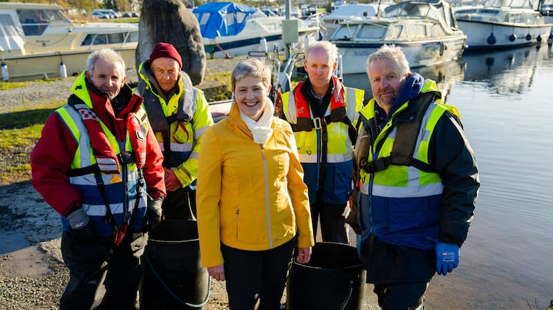 Geographer Susan Hegarty with the O'Connell brothers of the ESB Fisheries Team, Athlone, Co Westmeath