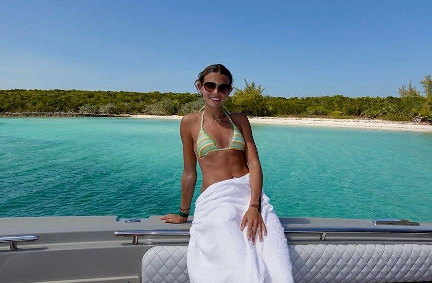 kai trump lounging on boat