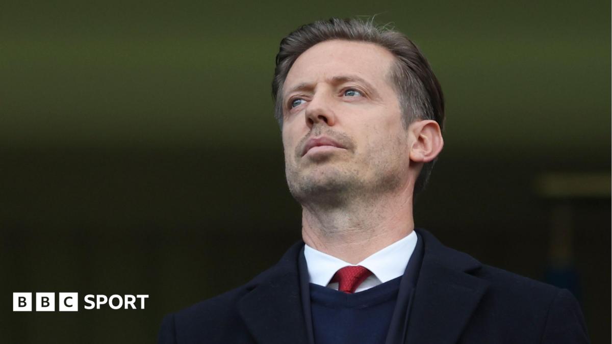 Michael Edwards at a Premier League match