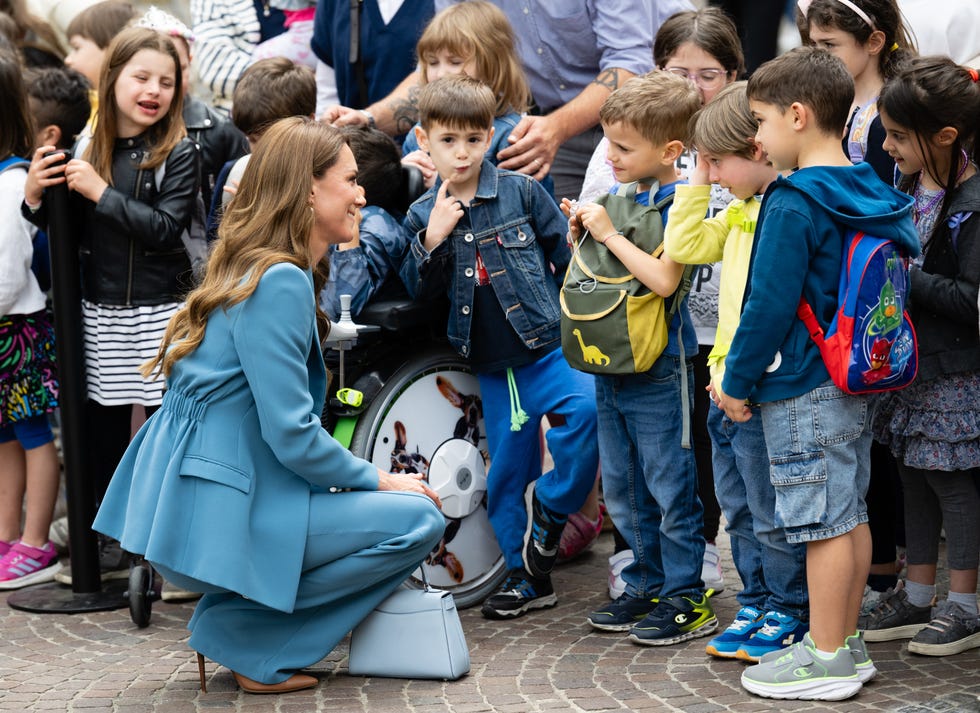 reggio emilia, italy may 13: catherine, princess of wales meets children as she visits the piazza camillo prampolini where she is welcomed to the city at reggio emilia’s town hall during the first day of her visit to reggio emilia on may 13, 2026 in reggio emilia, italy. the princess of wales is visiting the city in northern italy as the royal foundation centre for early childhood expands internationally. during her visit, she will explore leading approaches to early child development, which focusses on creativity, relationships and hands on discovery. the trip marks the future queens first overseas royal visit since her cancer treatment. (photo by samir hussein/wireimage)