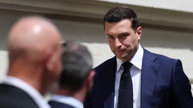 Jordan Bardella, president of the French far-right Rassemblement National (National Rally - RN) political party, arrives at the Rassemblement National headquarters before the verdict