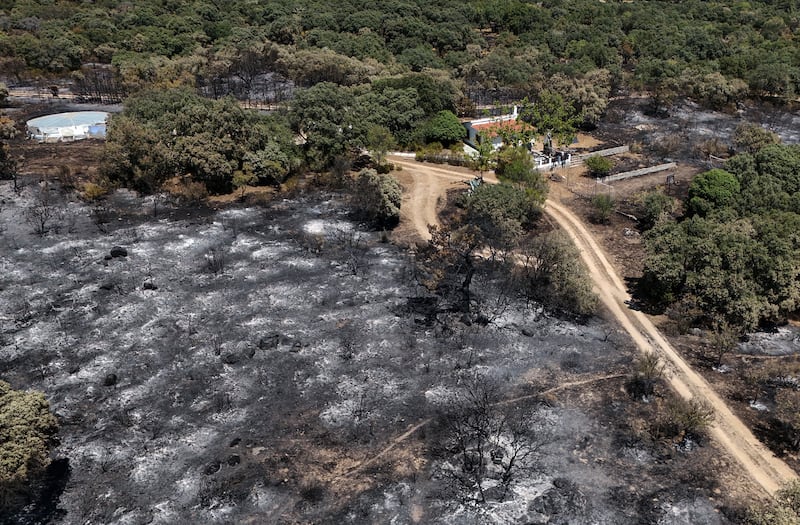 An aerial view of a house on scorched ground in the Camino de Navahonda area, following a wildfire near Robledo de Chavela, 60km west of Madrid, on Monday. Photograph: Getty Images