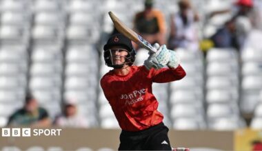 Australian Charli Knott playing for The Blaze, batting with a navy helmet on