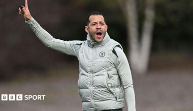Liam Rosenior points to the sky while delivering instructions to his players during Chelsea training