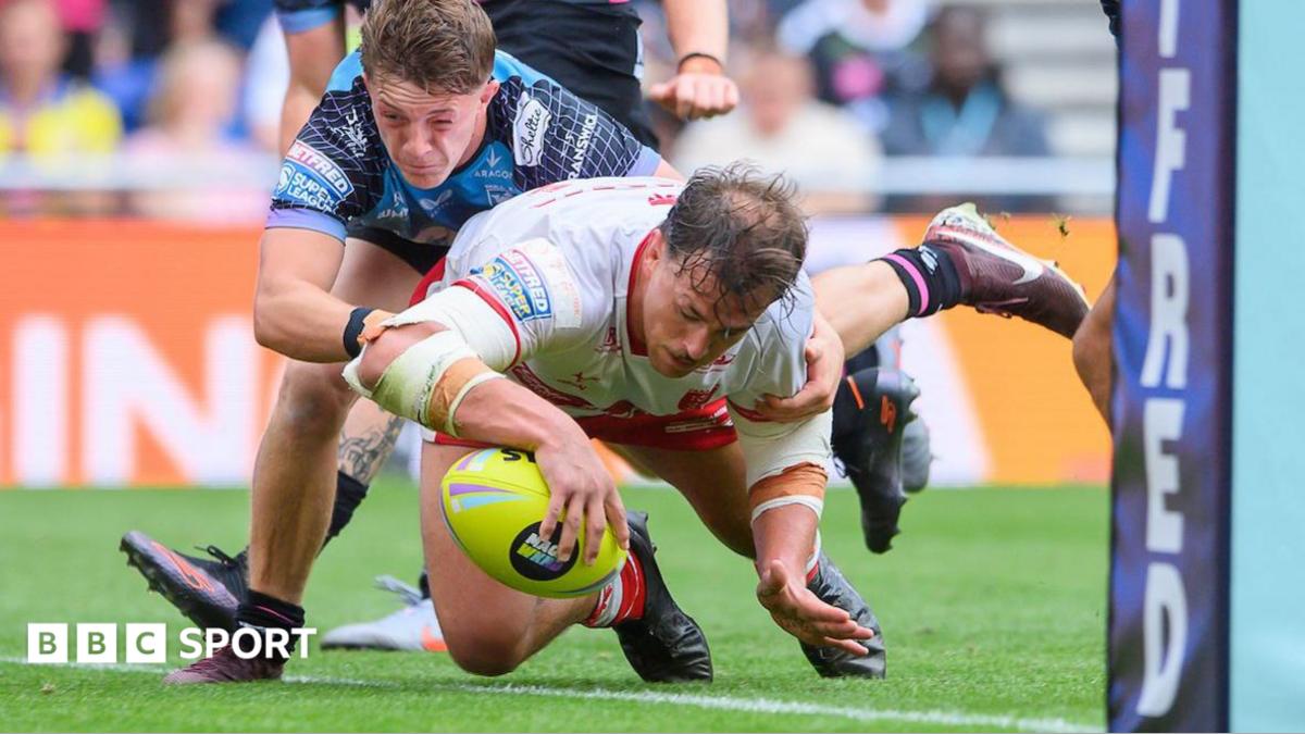 Hull KR's Jai Whitbread scores a try against Hull FC