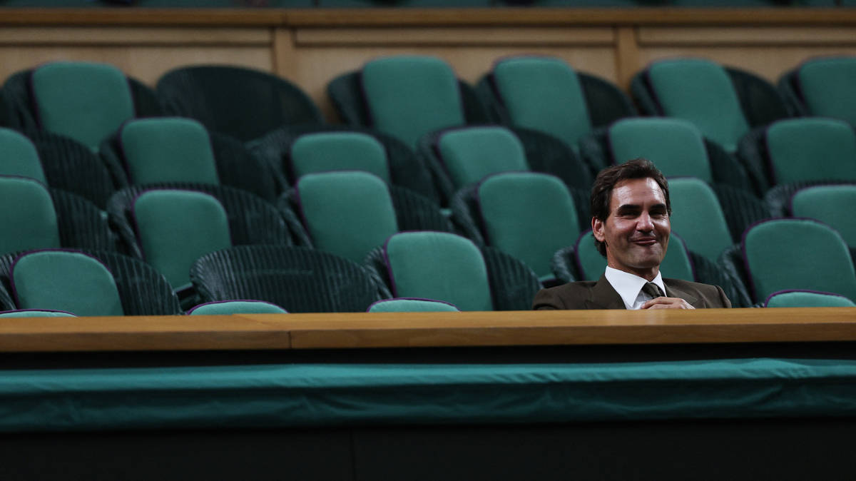 Roger Federer pictured all alone in Wimbledon Royal Box as celebrities desert match
