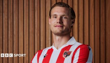 Svante Ingelsson folds his arms in a Stoke City red-and-white striped shirt
