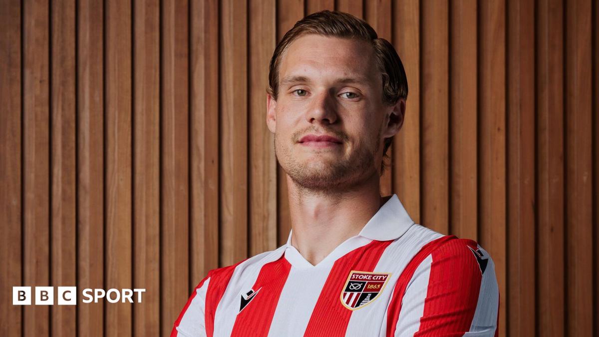 Svante Ingelsson folds his arms in a Stoke City red-and-white striped shirt