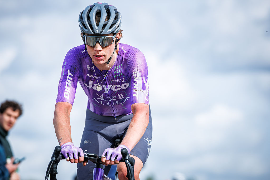Close up of O'Brien riding against a cloudy sky