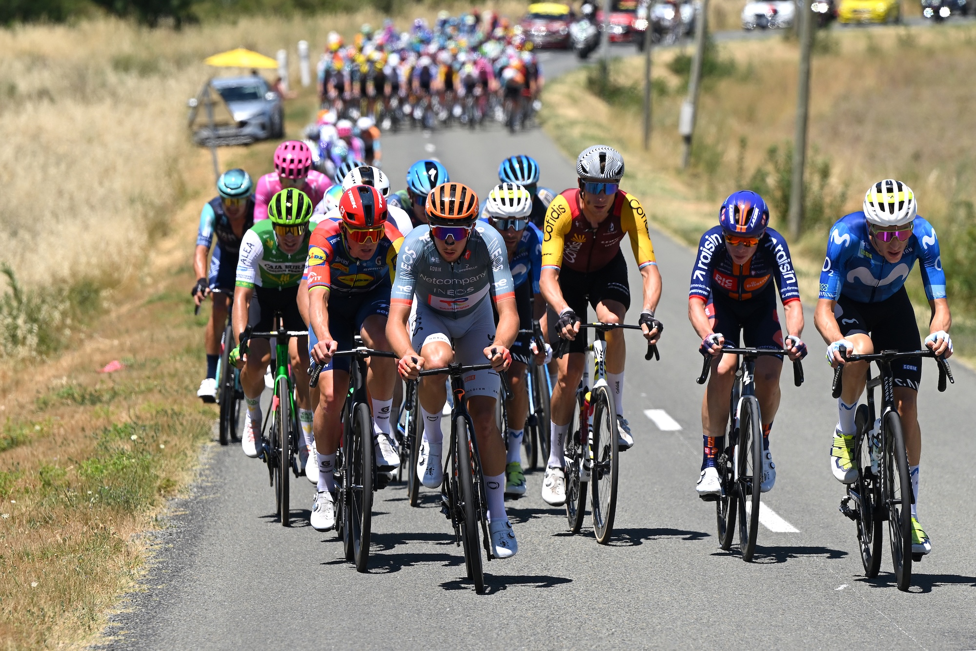 CARCASSONNE, FRANCE - JULY 07: (L-R) Mads Pedersen of Denmark and Team Lidl - Trek, Kevin Vauquelin of France and Netcompany INEOS Cycling Team, Alex Kirsch of Luxembourg and Team Cofidis, Frank van den Broek of Netherlands and Team Picnic PostNL and Pablo Castrillo of Spain and Team Movistar compete in the breakaway during the 113th Tour de France 2026, Stage 4 a 181.9km stage from Carcassonne to Foix / #UCIWT / on July 07, 2026 in Carcassonne, France. (Photo by Dario Belingheri/Getty Images)
