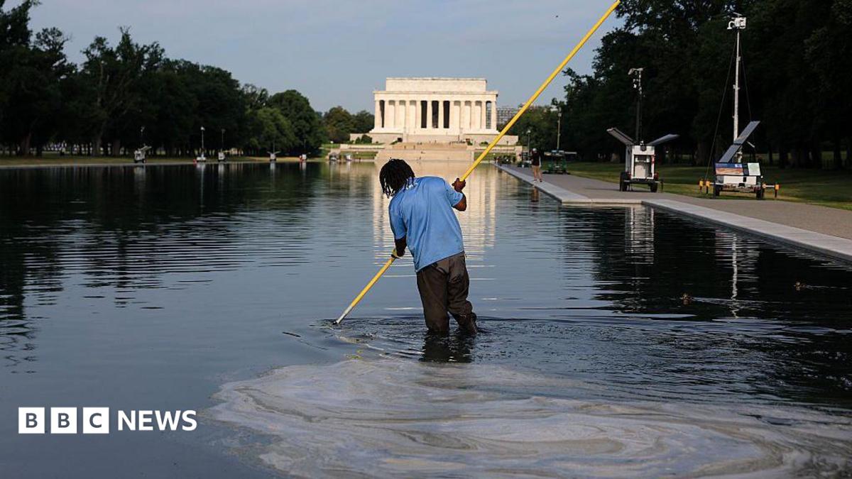 Workers clean the Lincoln Memorial Reflecting Pool on the National Mall on June 25, 2026 in Washington, DC.