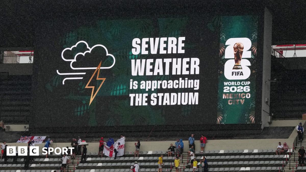 A sign displays 'Severe weather is approaching the stadium' at Mexico City's Azteca Stadium