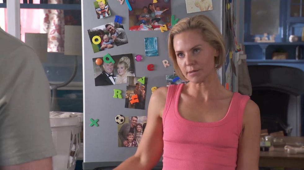 Hollyoaks Cindy Cunningham in front of fridge hollyoaks cindy cunningham in front of the osborne family fridge, covered in magnets and various photos of the family