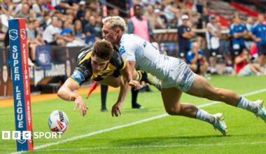 York Knights' Jon Bennison is caught by a try-saving tackle by Toulouse's Olly Ashall-Bott