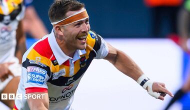 Chris Atkin celebrates scoring a try for Bradford Bulls