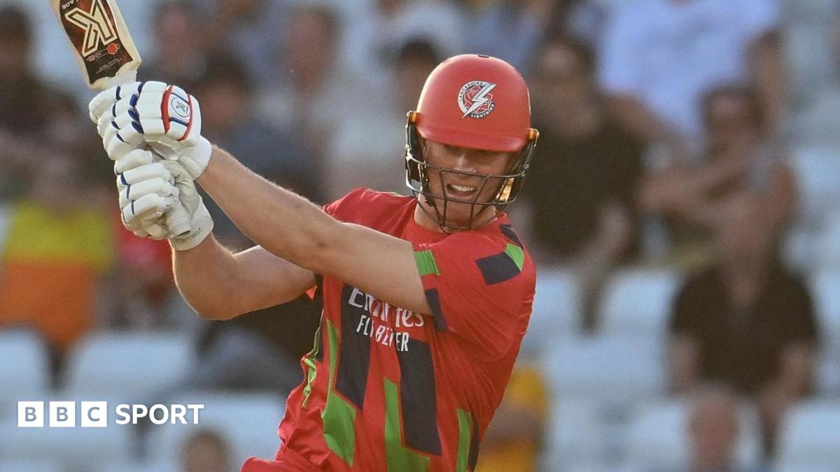 Keaton Jennings batting for Lancashire on a sunny evening in their red T20 kit