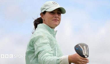 Darcey Harry acknowledges the crowd on the first tee during the final round of the AIG Women's Open 2025