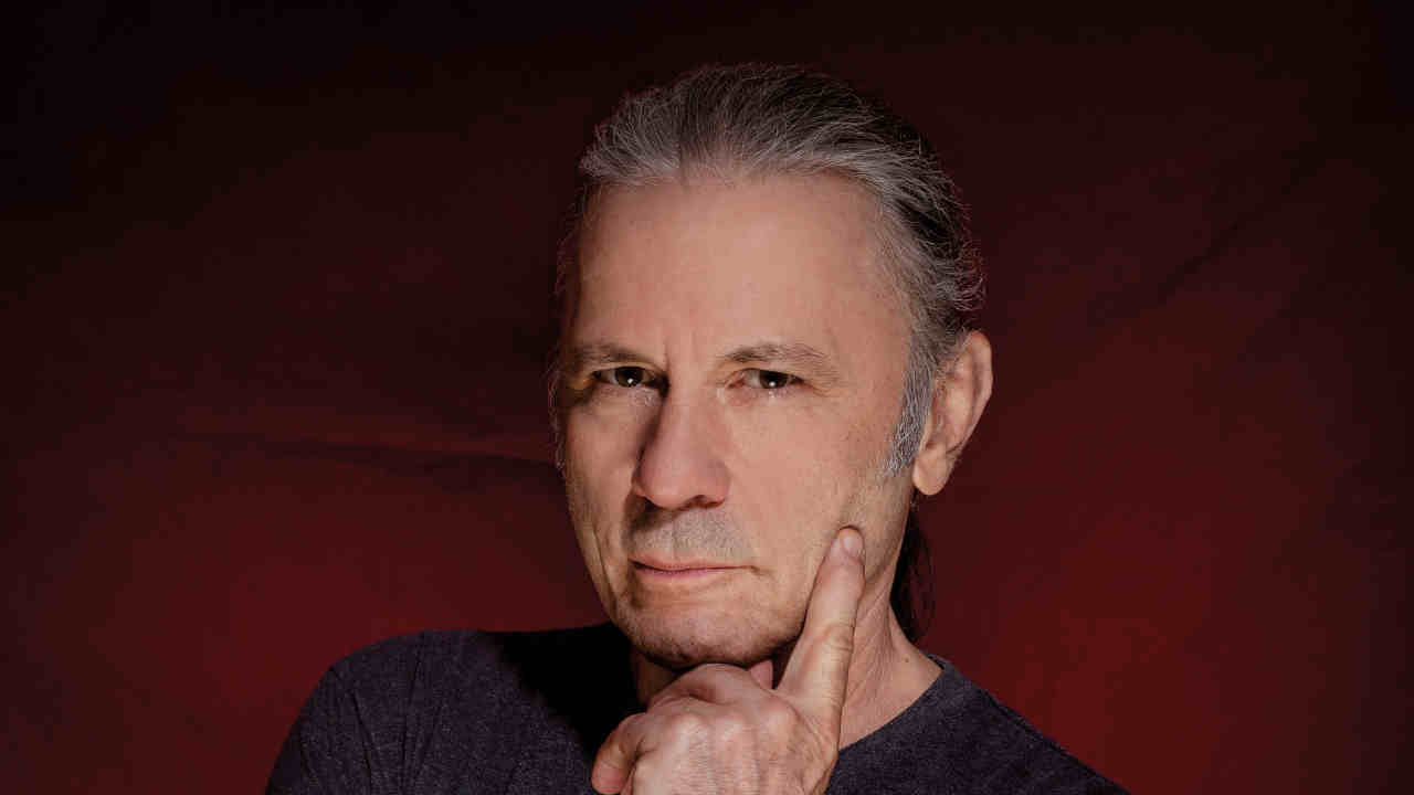 Iron Maiden&rsquo;s Bruce DIckinson posing for a photograph in 2021