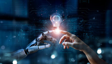 AI, Machine learning, Hands of robot and human touch on big data network, Brain data creative in light bulb, Science and artificial intelligence technology, innovation for futuristic.