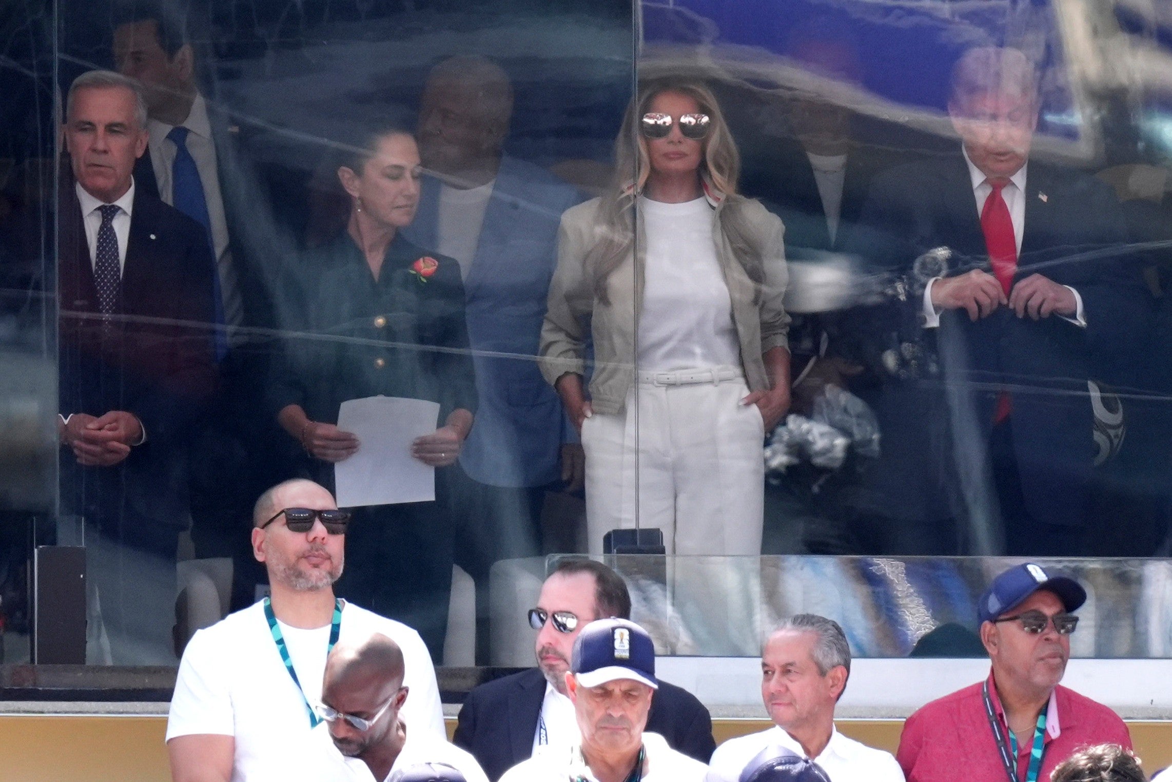 Canada's Prime Minister Mark Carney, Mexico's President Claudia Sheinbaum, first lady Melania Trump and President Donald Trump attend the final