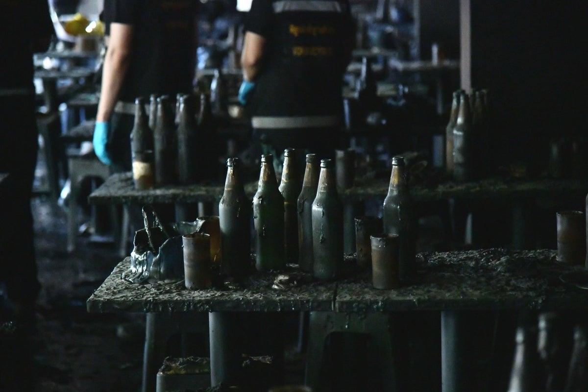 Photos show the aftermath of a Bangkok music bar fire