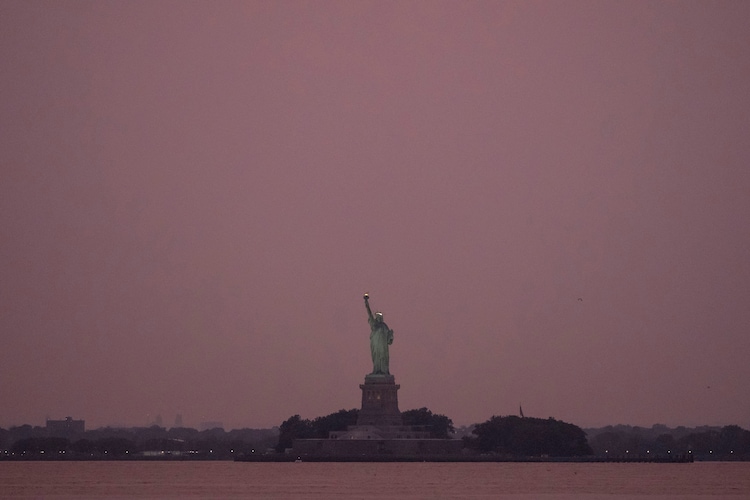 Statue of Liberty is seen through haze due to Canadian wildfire. (Photo: AP)