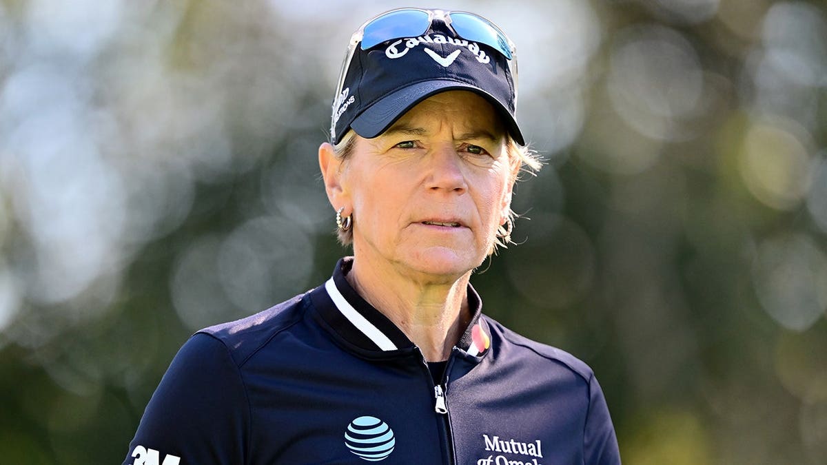 Annika Sorenstam looks on