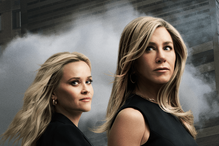 Apple_TV_The_Morning_Show_Key_Art_2_3 Reese Witherspoon as Bradley Jackson and Jennifer Aniston as Alex Levy walk the streets of Manhattan in The Morning Show season 4 poster.
