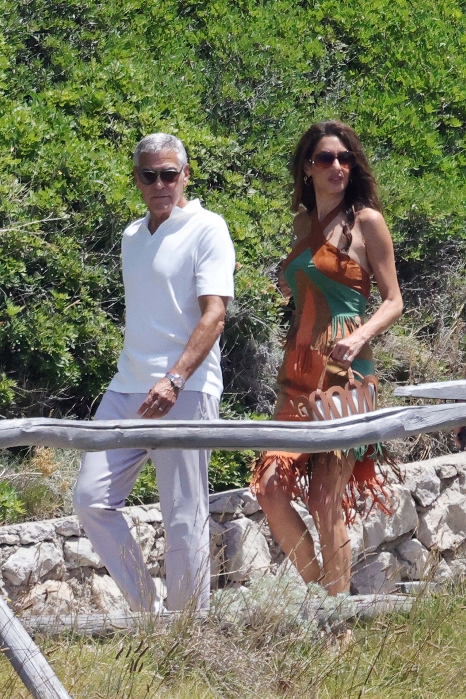 EXCLUSIVE Actor George Clooney and wife Amal enjoy a stylish summer Italian getaway as they visit the famous Villa...