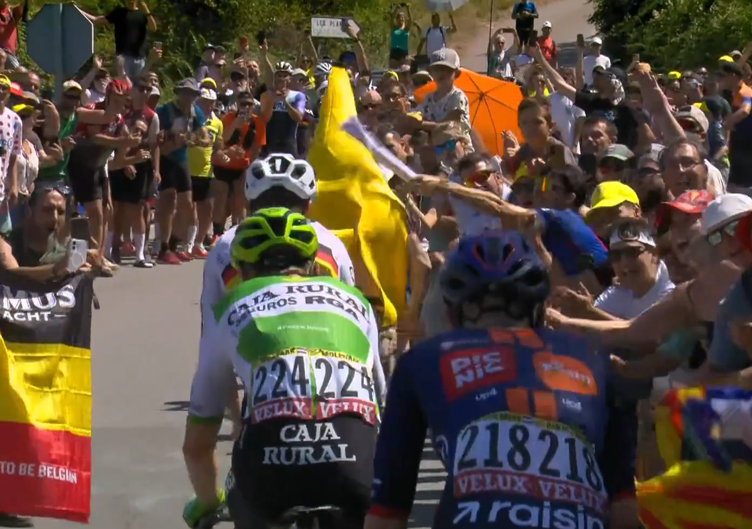 Banana fan runs in front of breakaway on stage two, 2026 Tour de France
