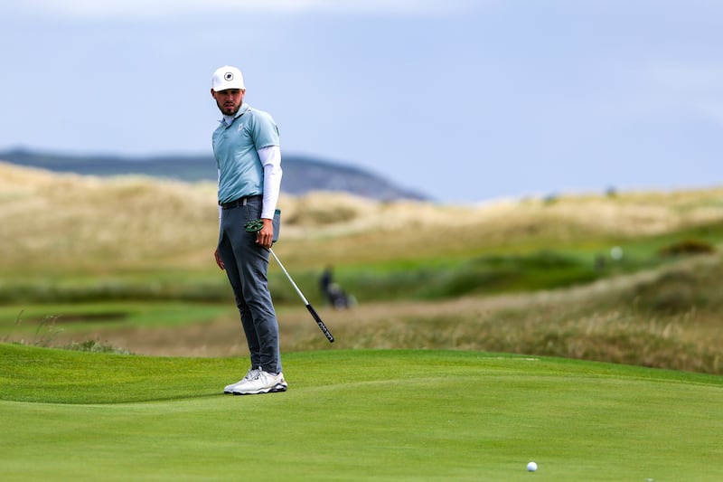 David Howard on the 7th green at Louth Golf Club during the East of Ireland Men's Amateur Open. Photograph: Bryan Keane/Inpho