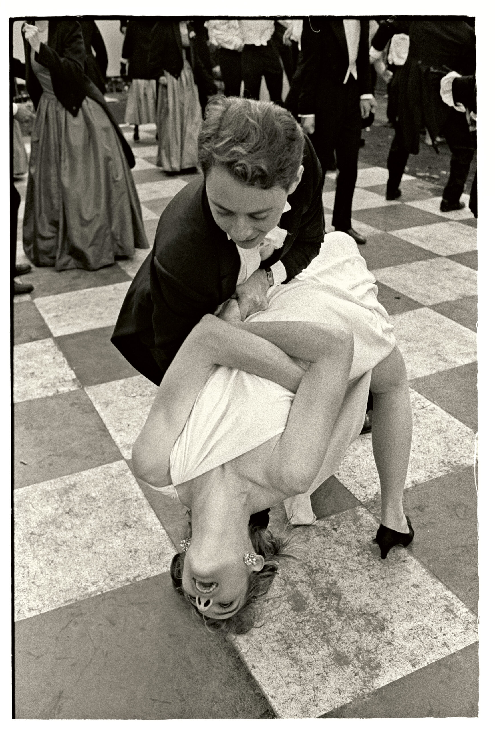 Andrew Soloman dancing with Julie Sheehan on a checkered dancefloor at Cambridge May Ball