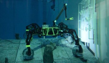 A German six-axis robot arm just welded a steel seam underwater with no diver present, an AI camera finding the joint and a continuous wire feeding the arc — taking over a job that kills at 40 times the rate of the average paycheck, one of the deadliest anyone does