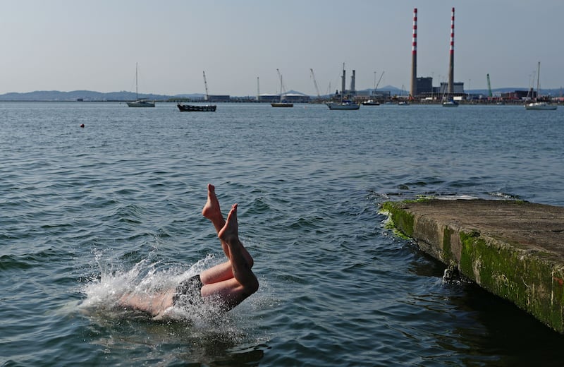 Eamon McCormack O’Connell dives in for morning swim in Clontarf, Dublin, last month. Photograph: Brian Lawless/PA Wire
