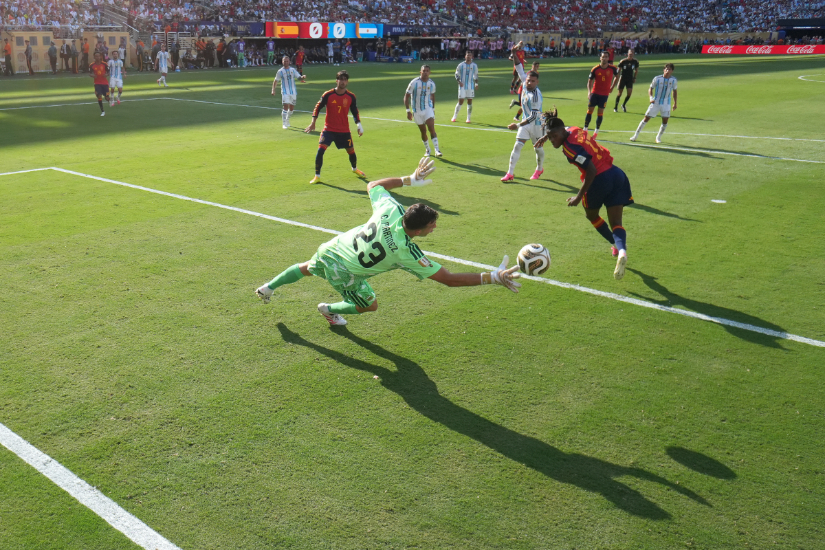 EAST RUTHERFORD, NEW JERSEY - JULY 19: (EDITORS NOTE: Image was captured using a remote netcam) Nico Williams #17 of Spain heads the ball saved by Emiliano Martinez #23 of Argentina during the FIFA World Cup 2026 Final match between Spain and Argentina at New York New Jersey Stadium on July 19, 2026 in East Rutherford, New Jersey. (Photo by Dan Mullan/Getty Images)
