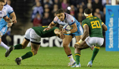 Scotland's Sione Tuipulotu tries to evade South Africa tacklers during the November 2024 match at Murrayfield