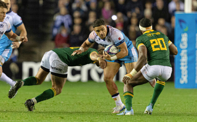 Scotland's Sione Tuipulotu tries to evade South Africa tacklers during the November 2024 match at Murrayfield