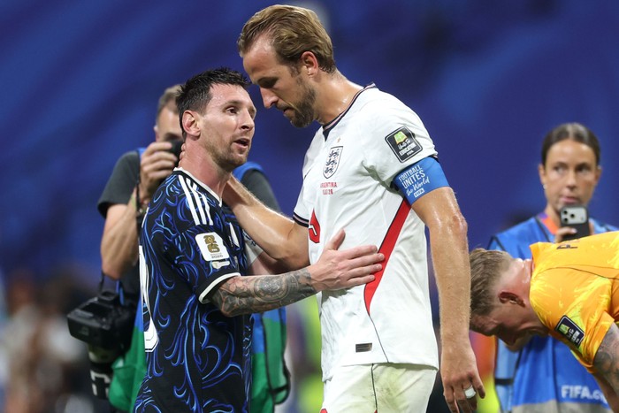 England v Argentina: Semi Final - FIFA World Cup 2026 England captain Harry Kane, in white football kit, and Argentina captain Lionel Messi, in blue kit, at World Cup 2026.