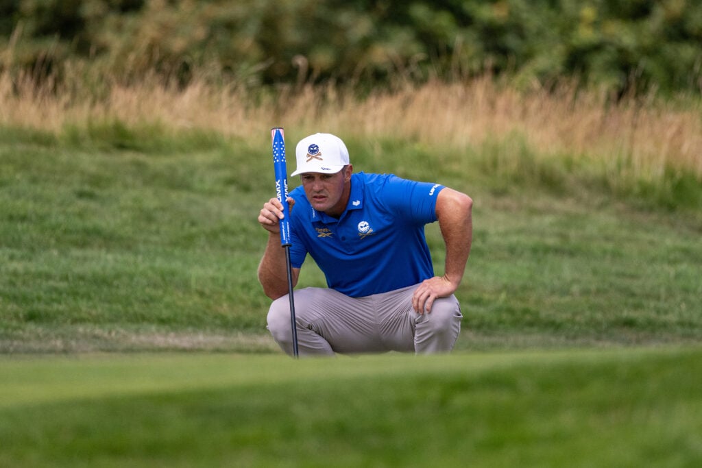 Bryson DeChambeau in action during day one of LIV Golf UK at JCB Golf & Country Club