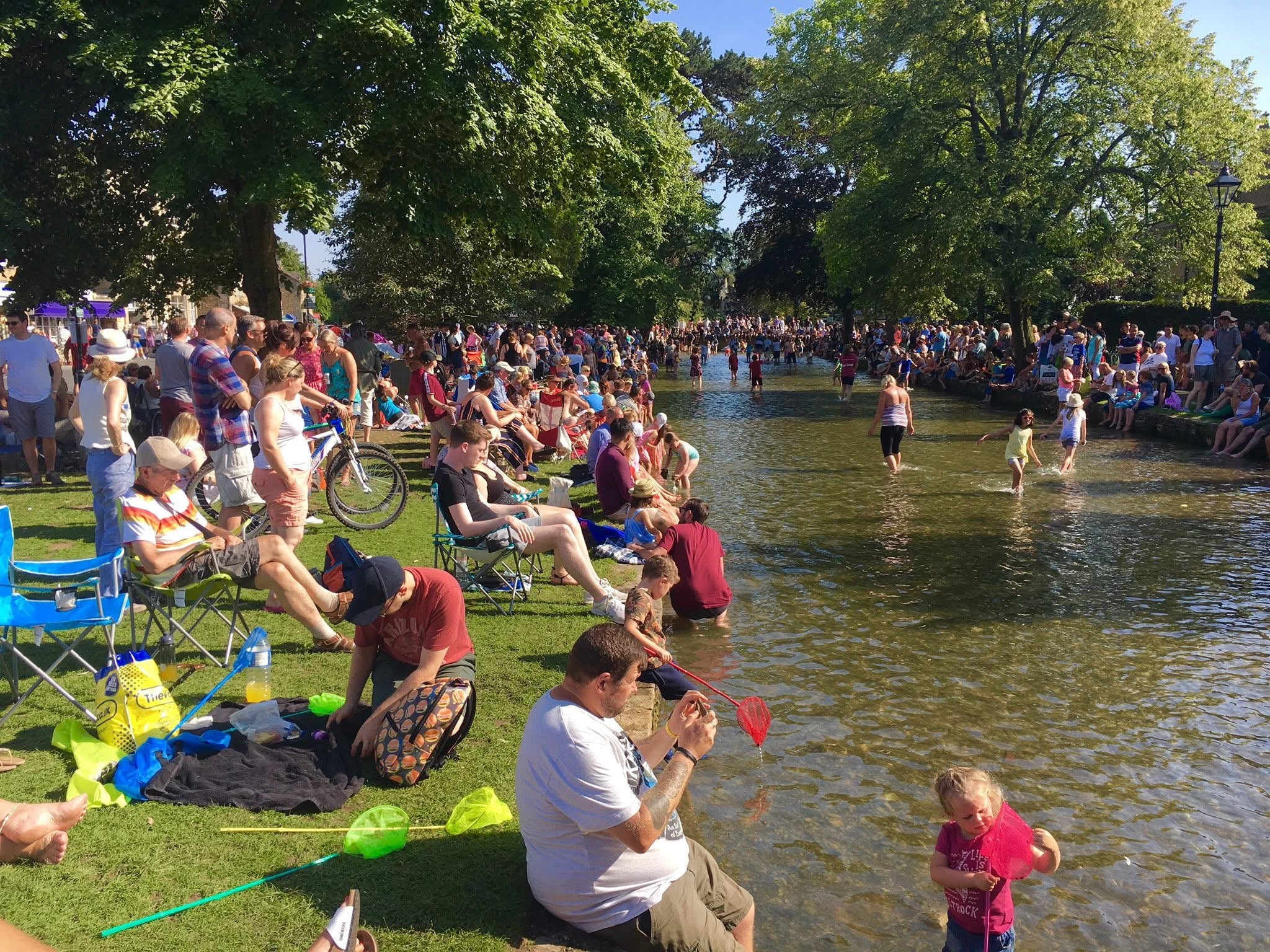Bourton-on-the-Water’s beautiful river attracts millions of tourists in the hot weather