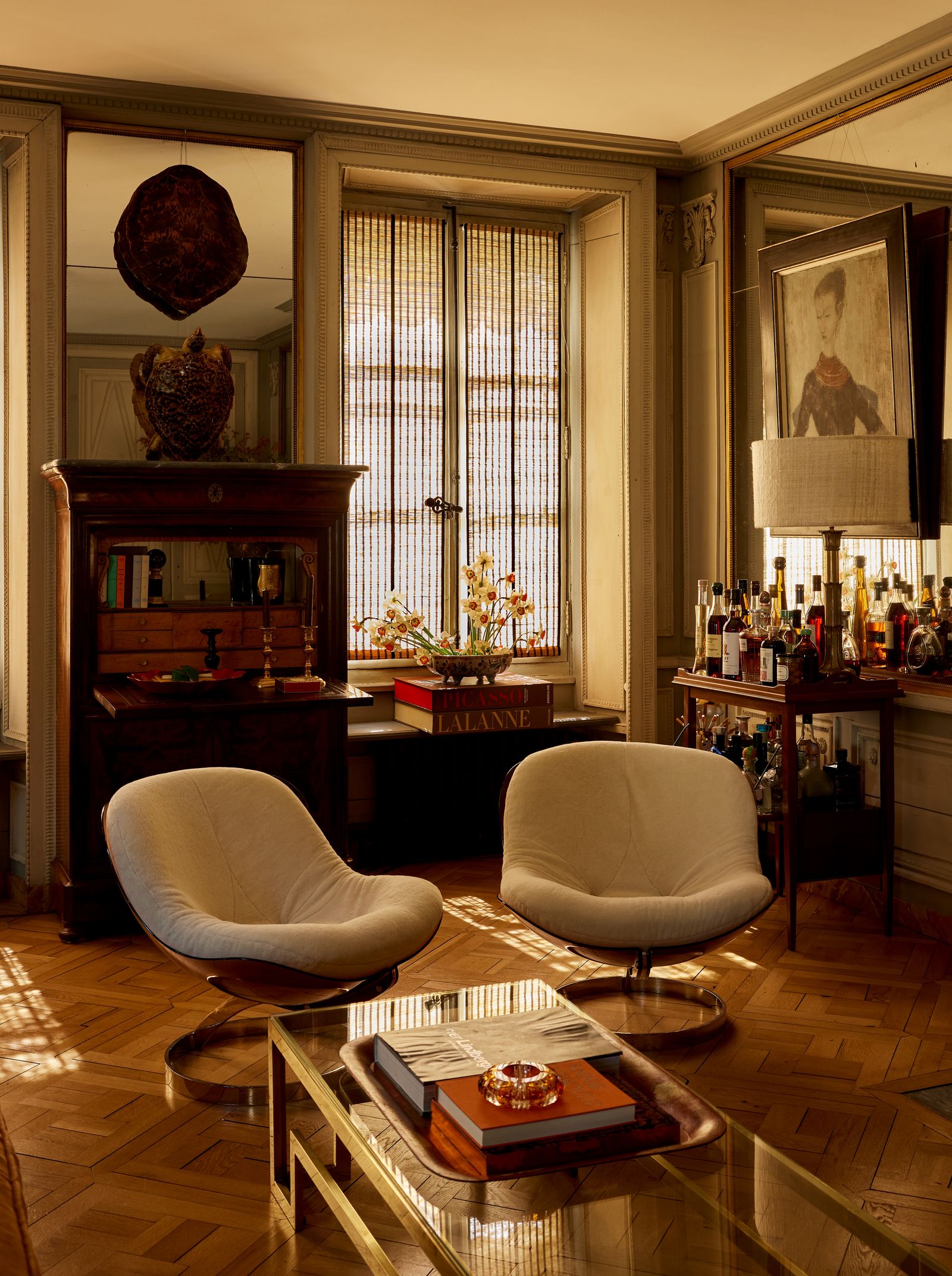 Image may contain Architecture Building Furniture Indoors Living Room Room Chair Table and Coffee Table