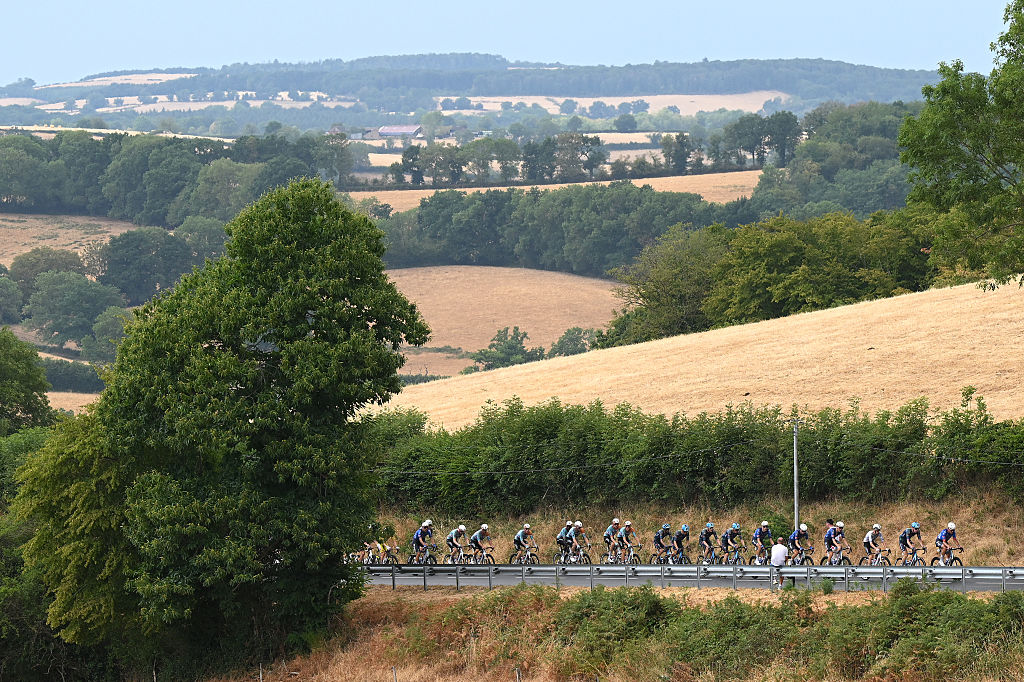 CHALON-SUR-SAONE, FRANCE - JULY 16: A general view of the peloton passing through a landscape during the 113th Tour de France 2026, Stage 12 a 179.1km stage from Circuit Nevers Magny-Cours to Chalon-sur-Saone / #UCIWT / on July 16, 2026 in Chalon-sur-Saone, France. (Photo by Dario Belingheri/Getty Images)