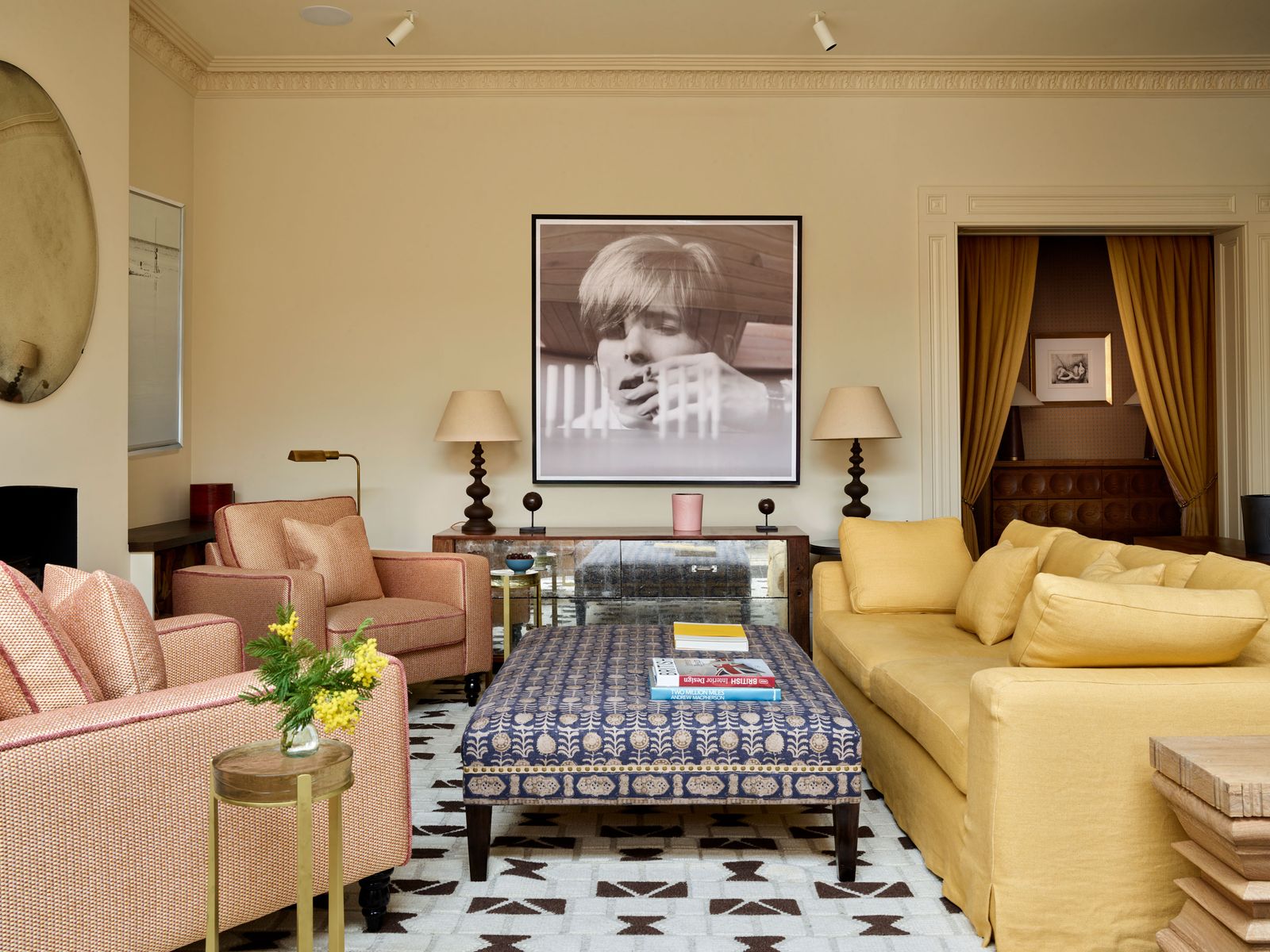 Image may contain David Bowie Furniture Lamp Home Decor Baby Person Cup Art Painting Couch Face and Head