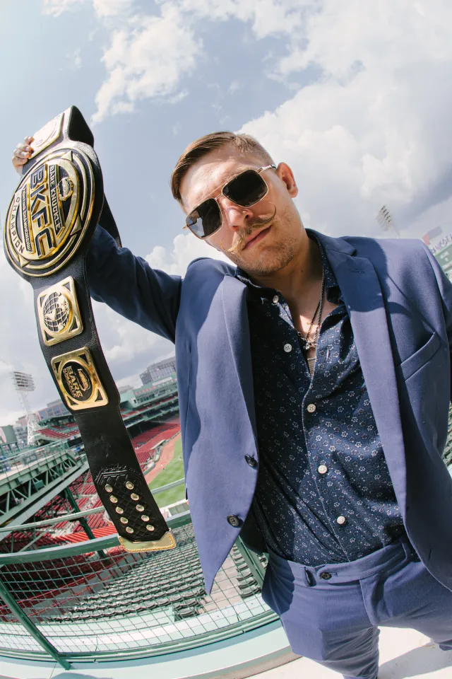 Kai Stewart shows off his BKFC title in Fenway Park ahead of BKFC 92